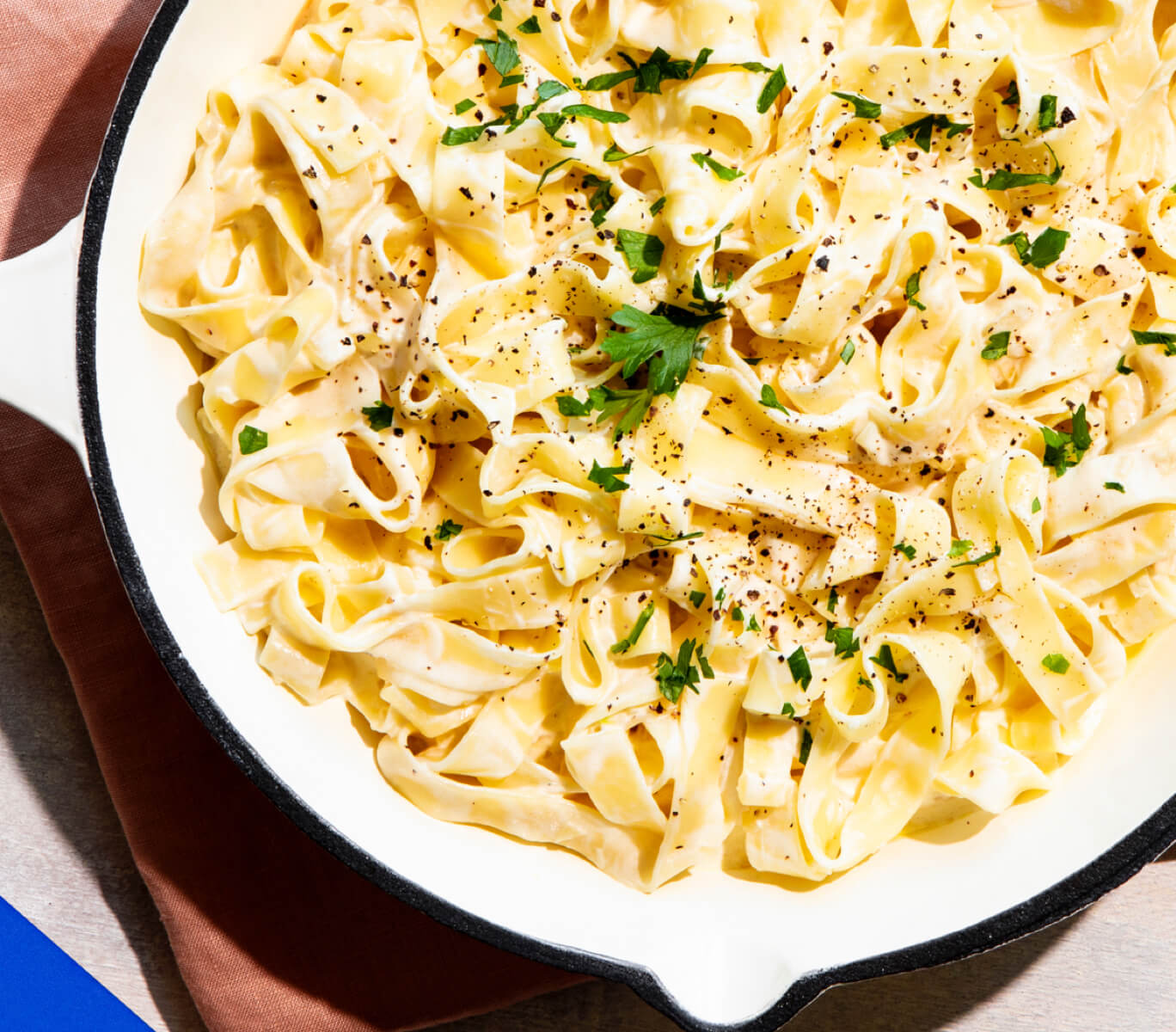 Long Pasta Shapes In Creamy Alfredo Sauce