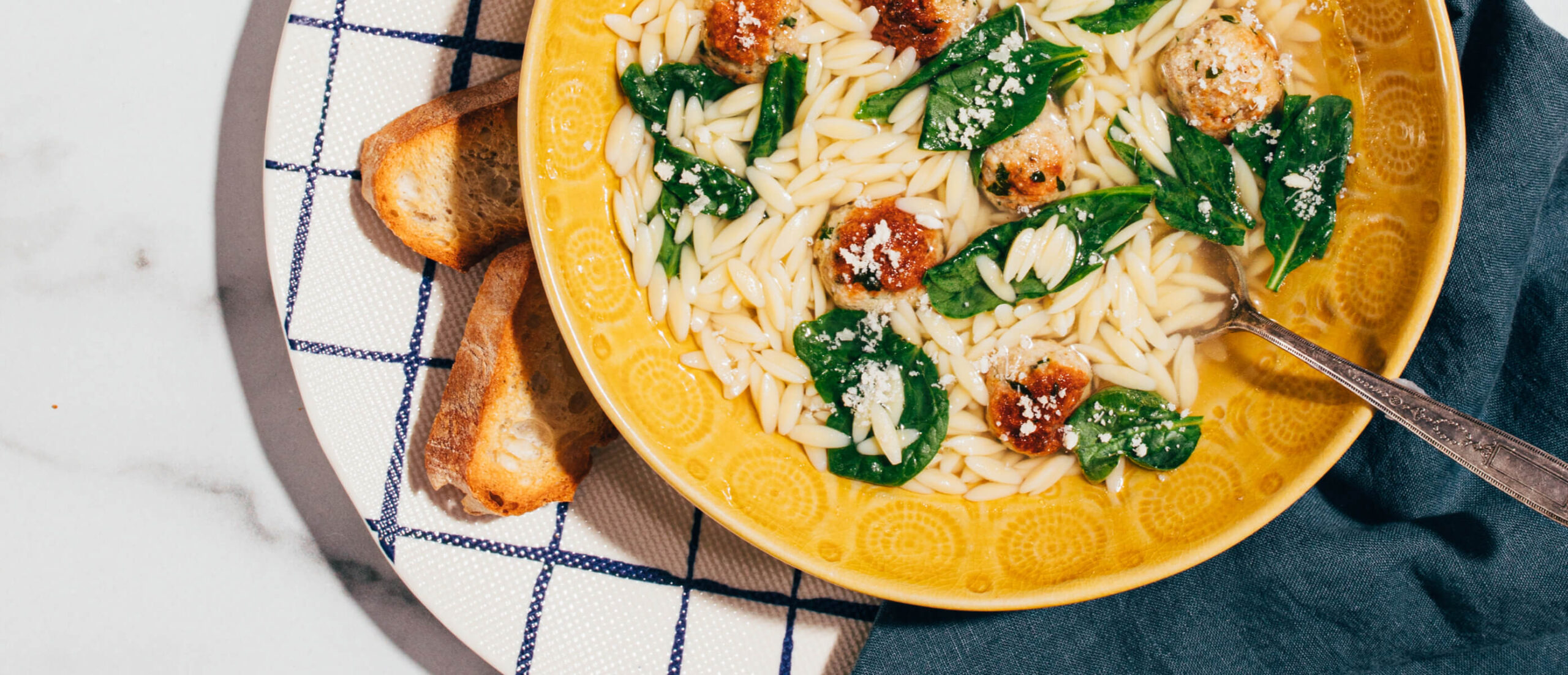 Orzo Pasta Italian Wedding Soup With Spinach In Bowl