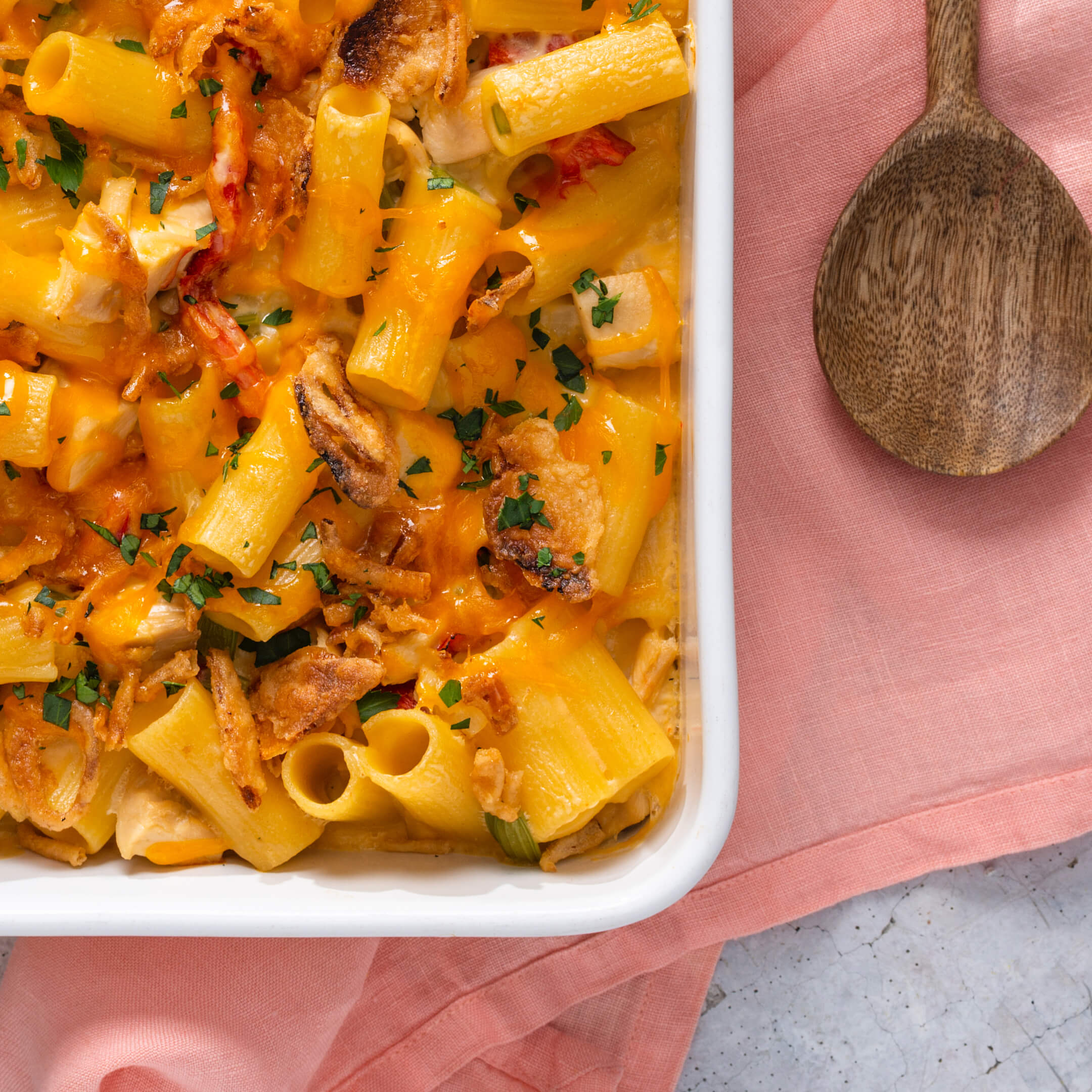 Casserole dish with cheesy rigatoni pasta and chicken