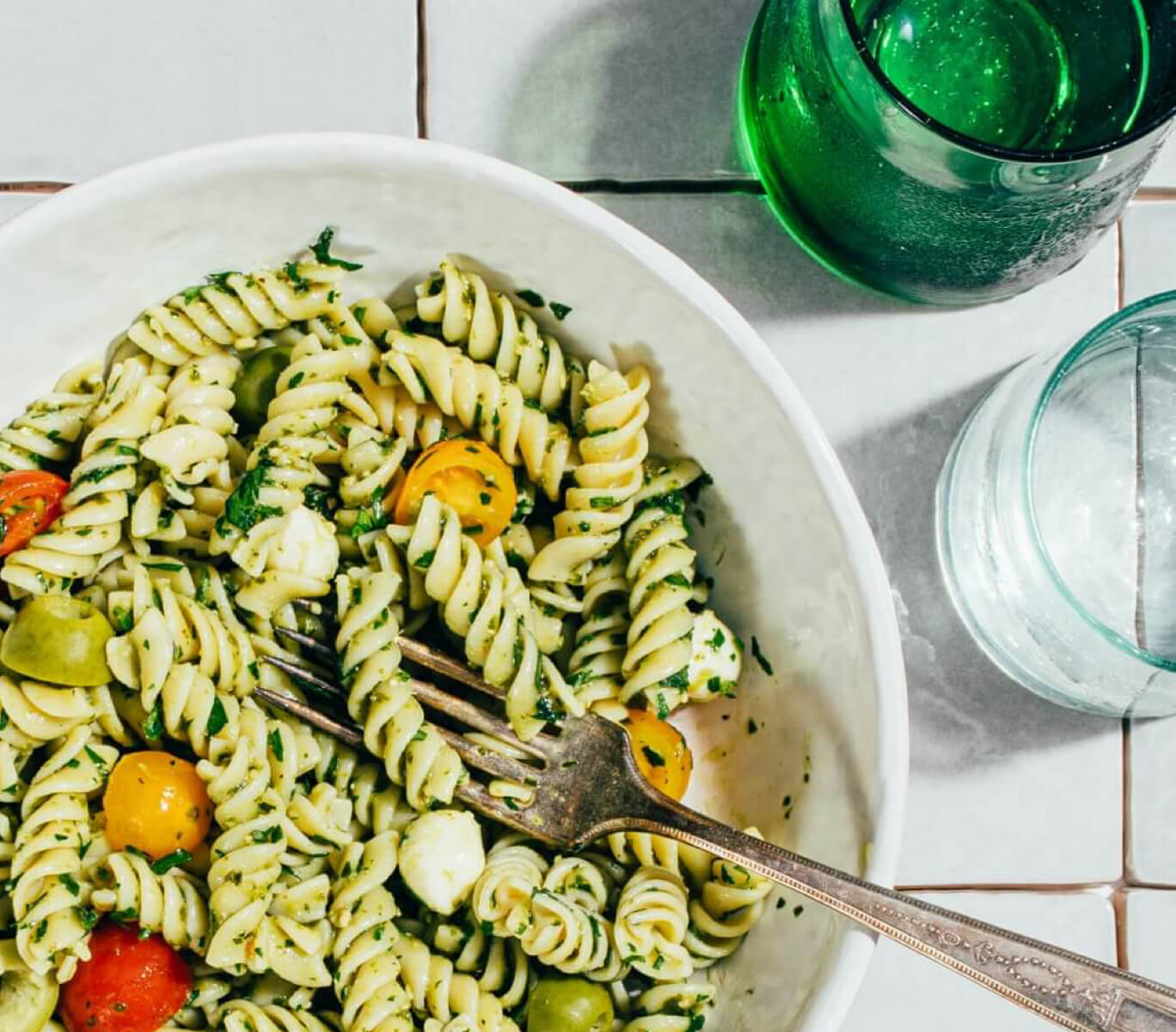 Rotini Pasta Salad With Blender Pesto Sauce In Bowl With Fork