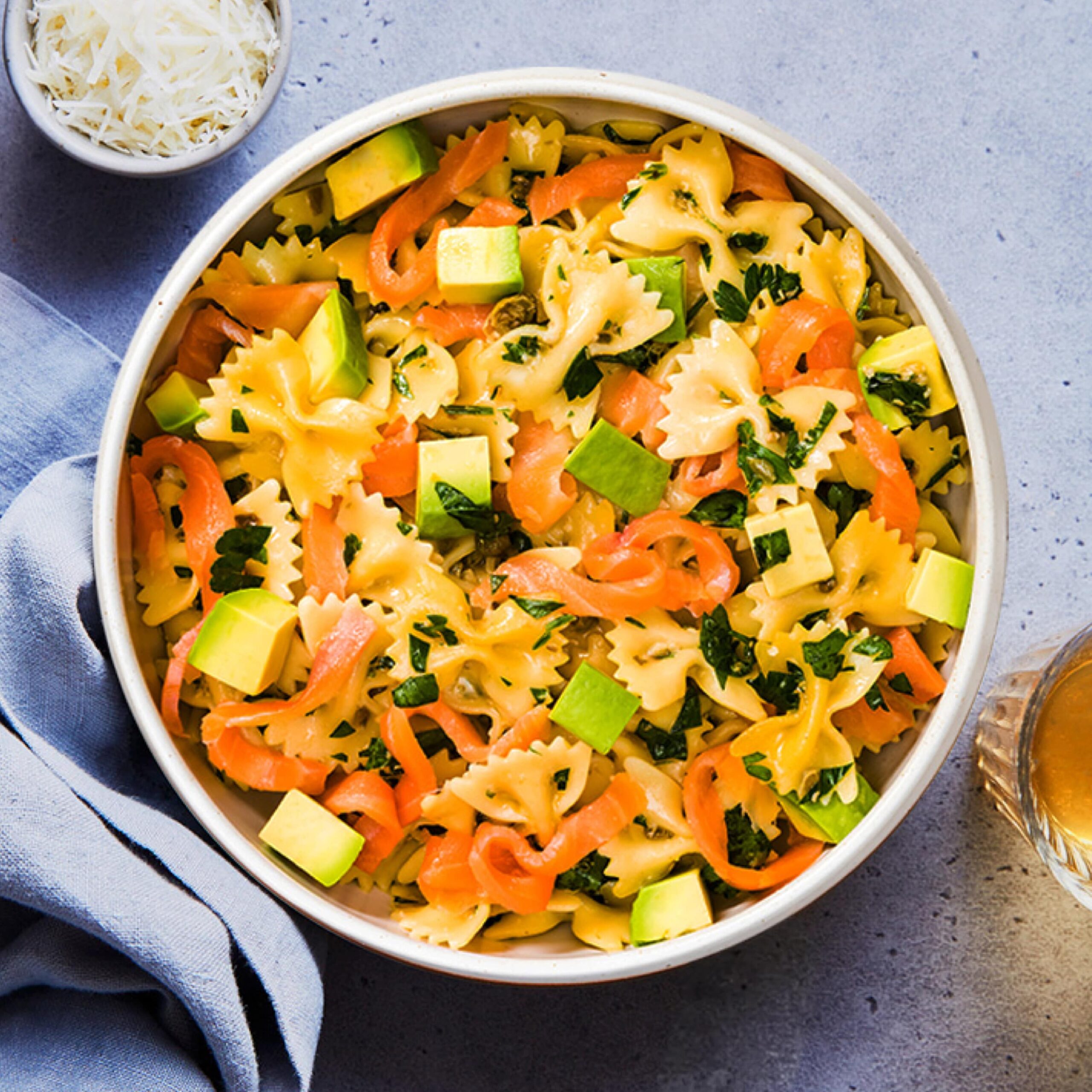 bowtie pasta with smoked salmon and avocado with herbs