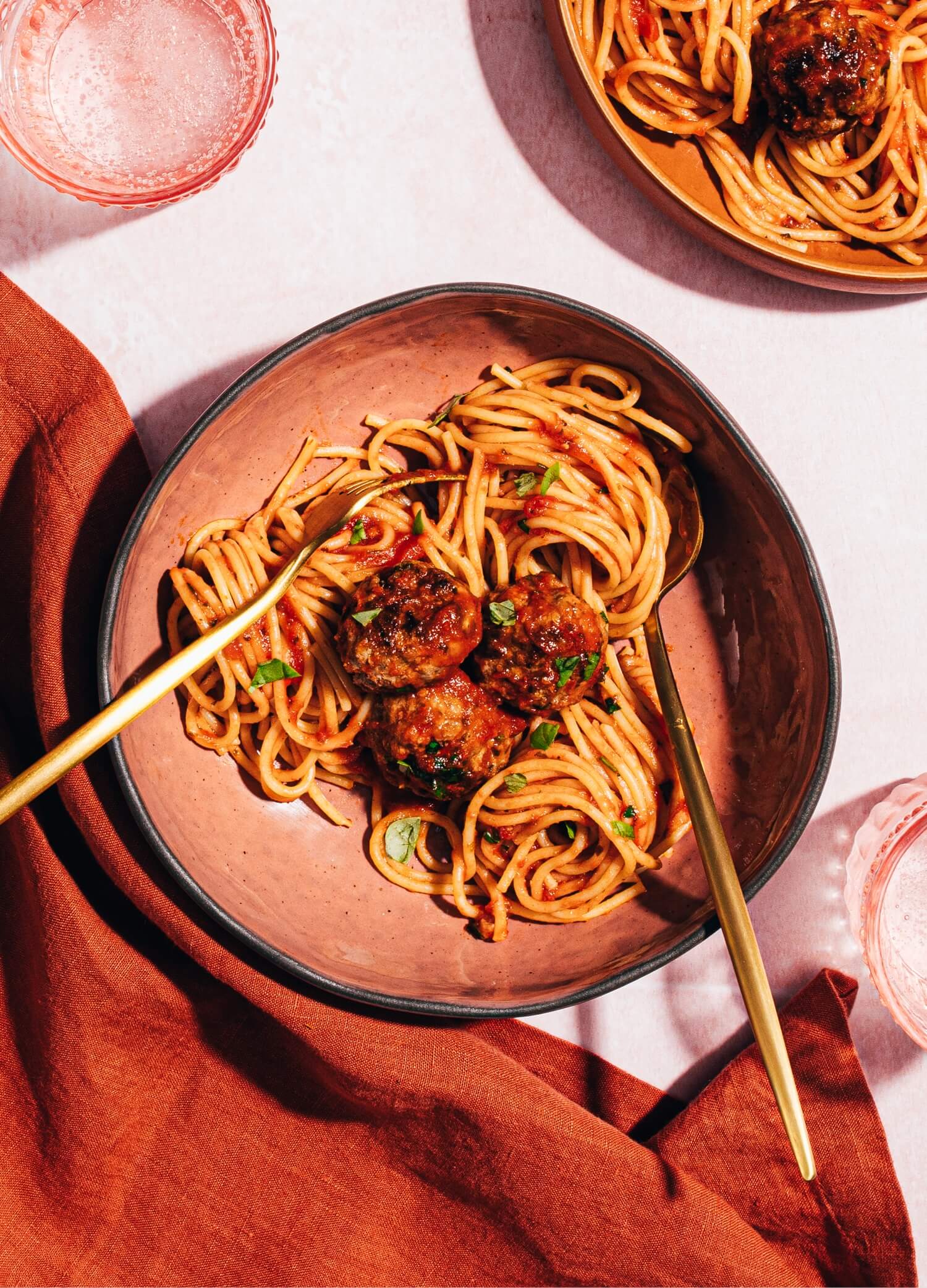 spaghetti and meatballs in serving bowl