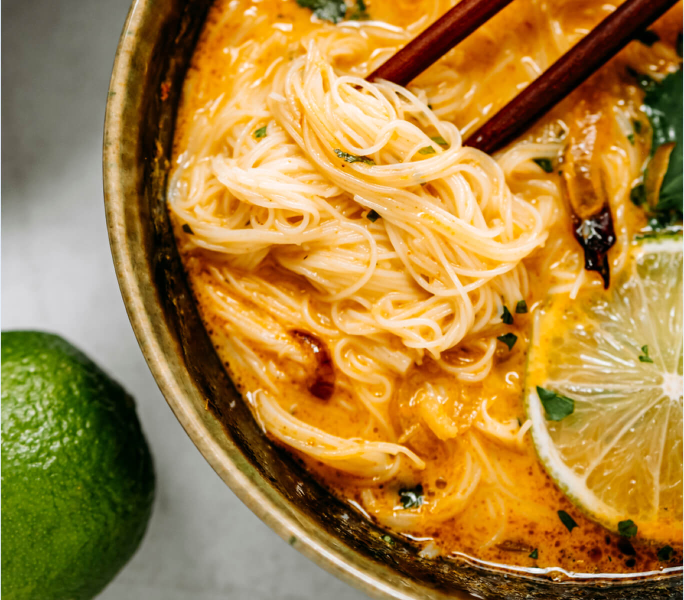 Thin Pasta Shape In Broth With Chopsticks